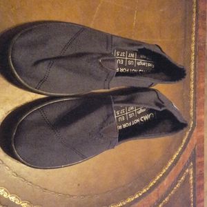 NWOT Toms Navy Slip ons